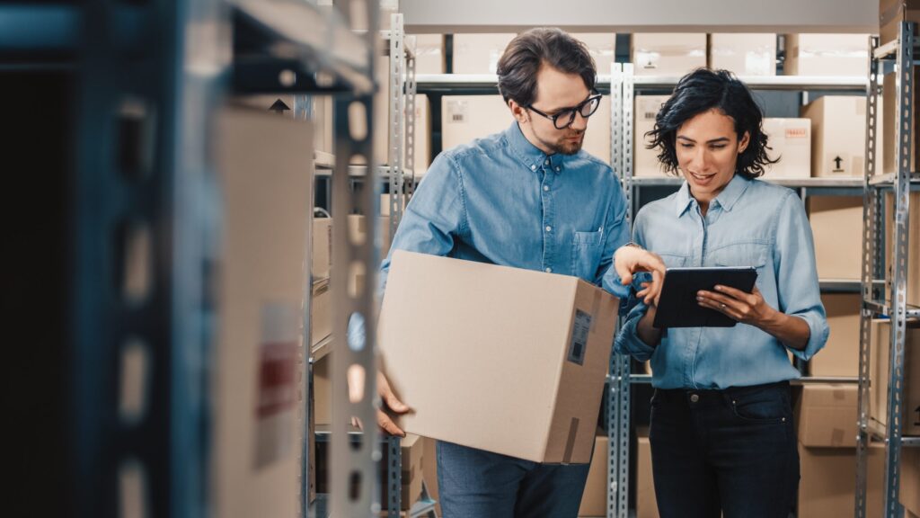 Business owners looking over call answering data analytics