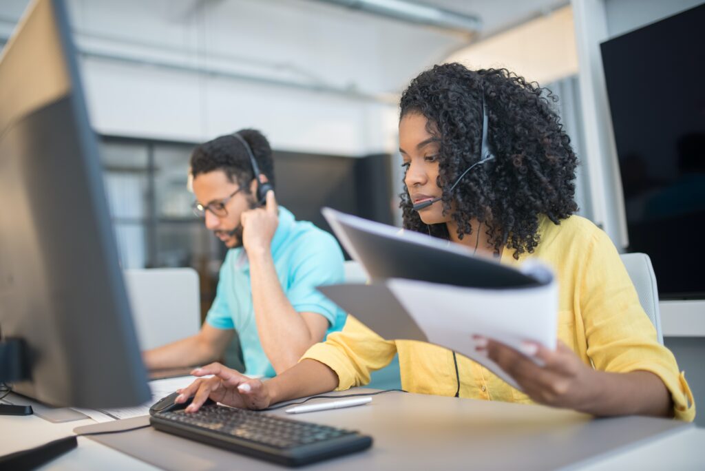 nexa receptionist typing on her computer