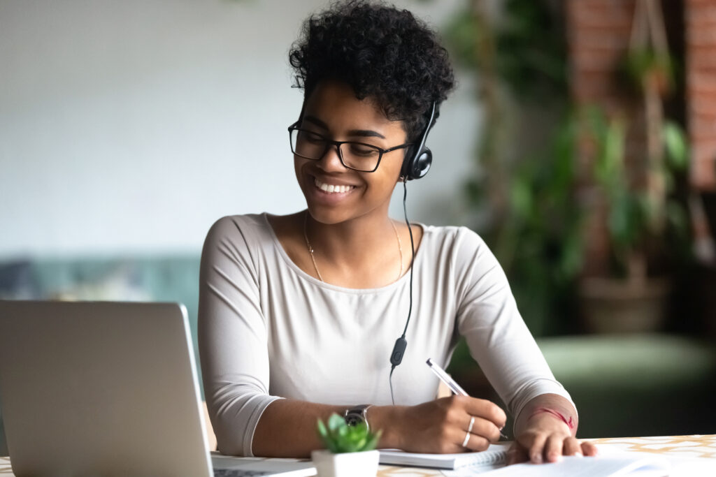 Virtual receptionist smiling while answering client call
